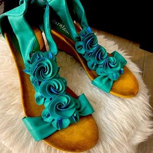 Cute teal wedge sandals.